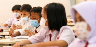 Kebijakan PTM 100% Adalah Penyebab Meningkatnya Kasus Omicron?