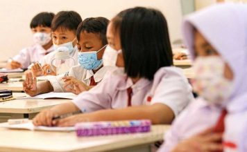 Kebijakan PTM 100% Adalah Penyebab Meningkatnya Kasus Omicron?